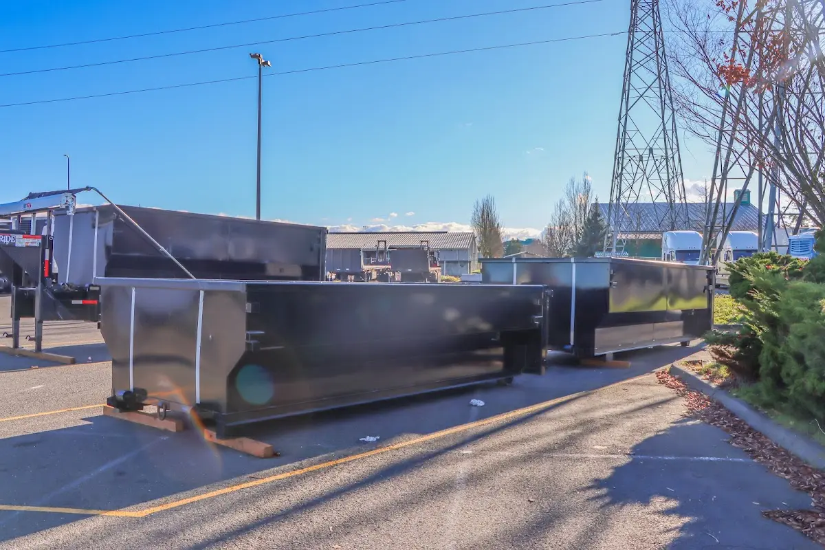 Roll-off dumpster ready for waste disposal at job site for Demolition Dumpster Rental in Carlisle